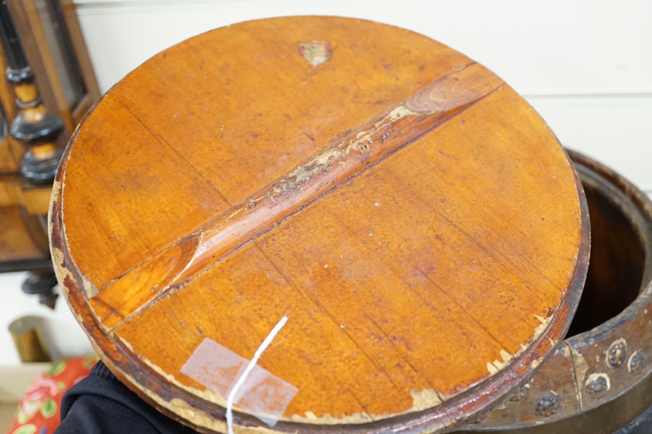 A Chinese lacquer decorated wood barrel form seat/storage container, 40cms high